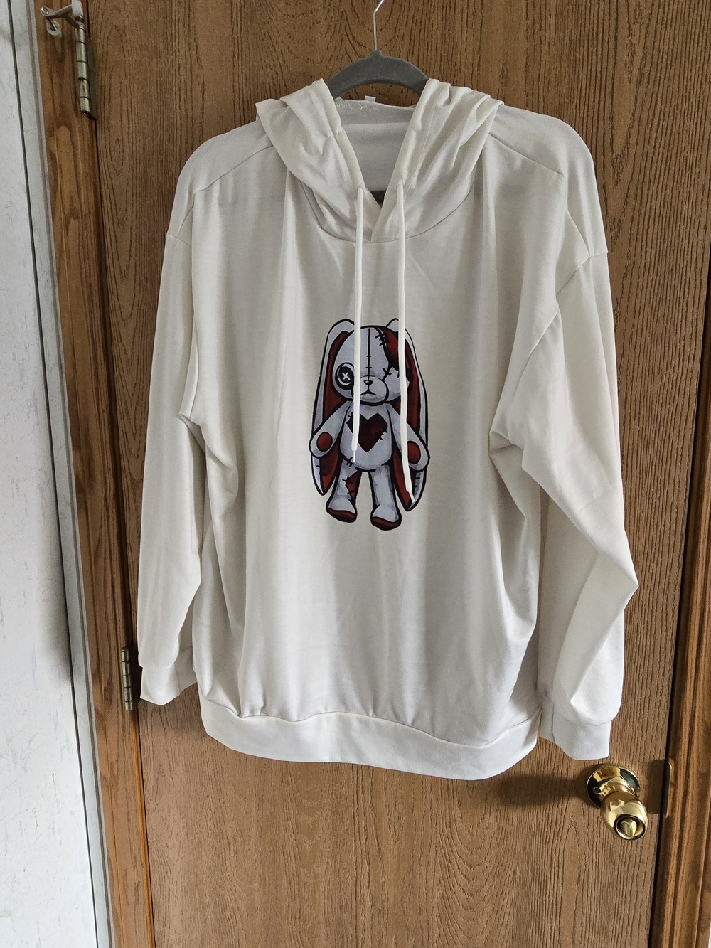 Plushie Dreadful Cream Hoodie with Graphic Bunny Print